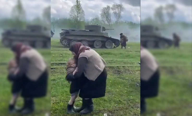 False: A video shows families fleeing the Russian invasion of Ukraine as a battle tank fires at people.