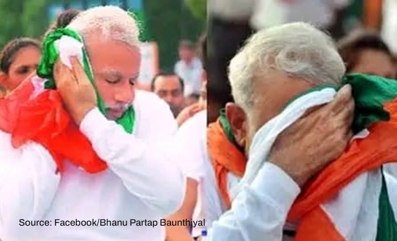 Misleading: PM Modi insulted the National Flag by wiping the sweat off his face with it.