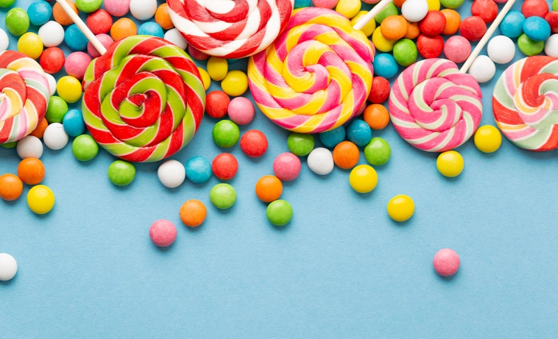 True: Candies are coated with Shellac, a resin-like by-product of the Lac insect.