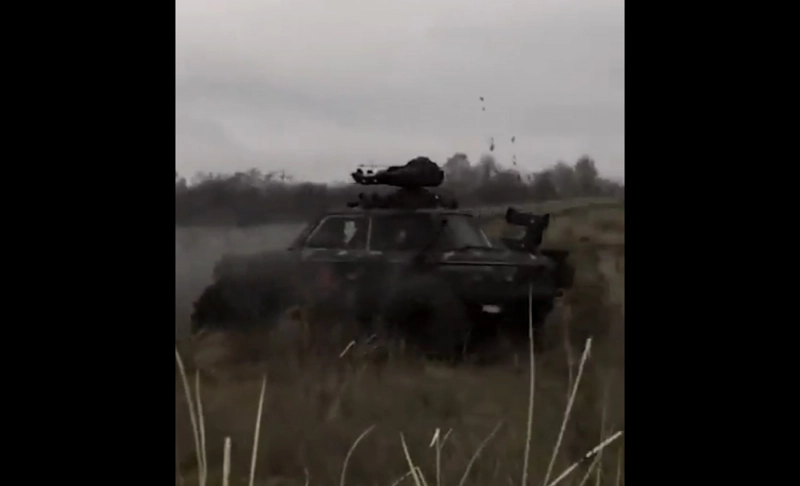 False: A video shows a scene from the Russian invasion of Ukraine, where an armored motorcar destroys tank convoys.
