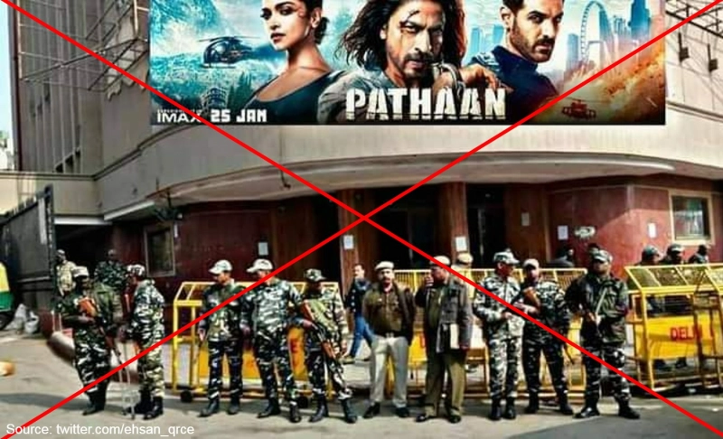 False: The image shows security personnel guarding a movie theater ahead of Pathaan's release.