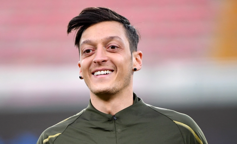 False: Mesut Ozil was dismissed from Germany's national team for condemning China's treatment of Uyghur Muslims.