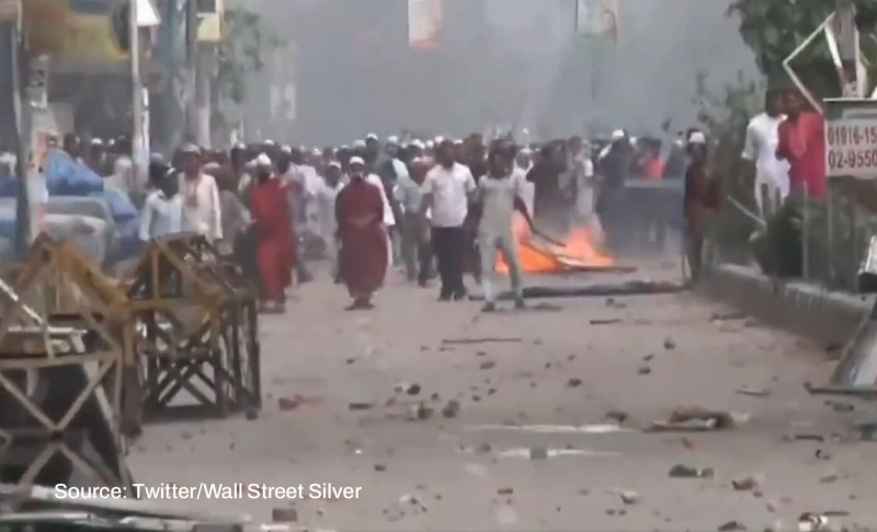 False: A video shows people pelting stones at police officials to protest fuel price hike in Bangladesh.